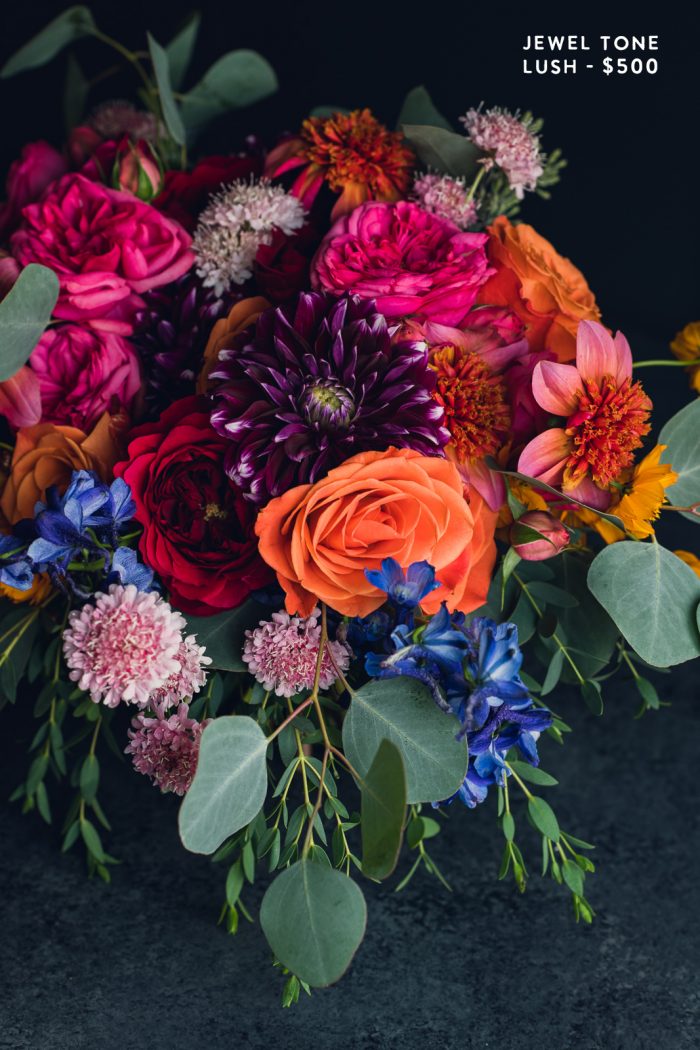 vibrant jewel tone bouquet of roses and dahlias