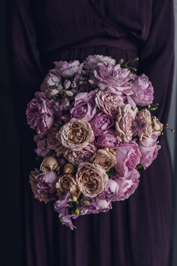 teardrop bouquet of pink and purple roses