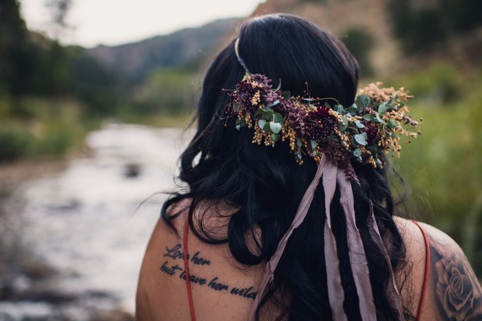 inked bride wearing a textural floral elopement crown