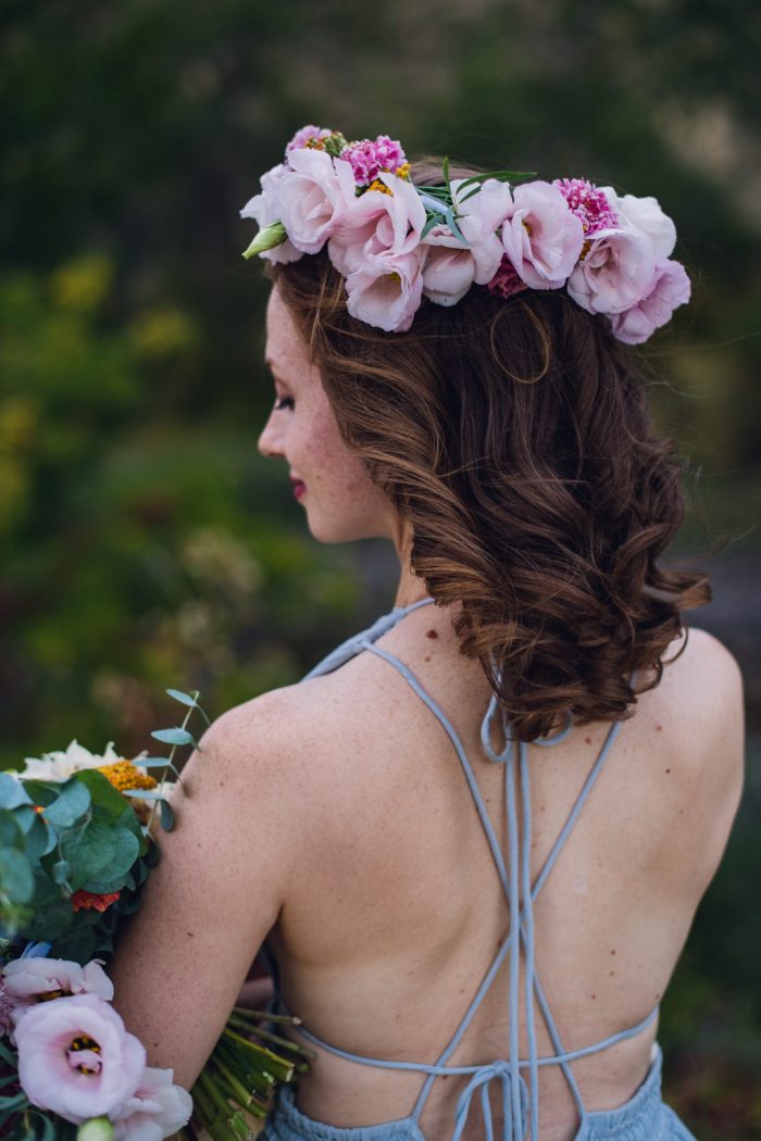 bride wearing floral crown during her elopement