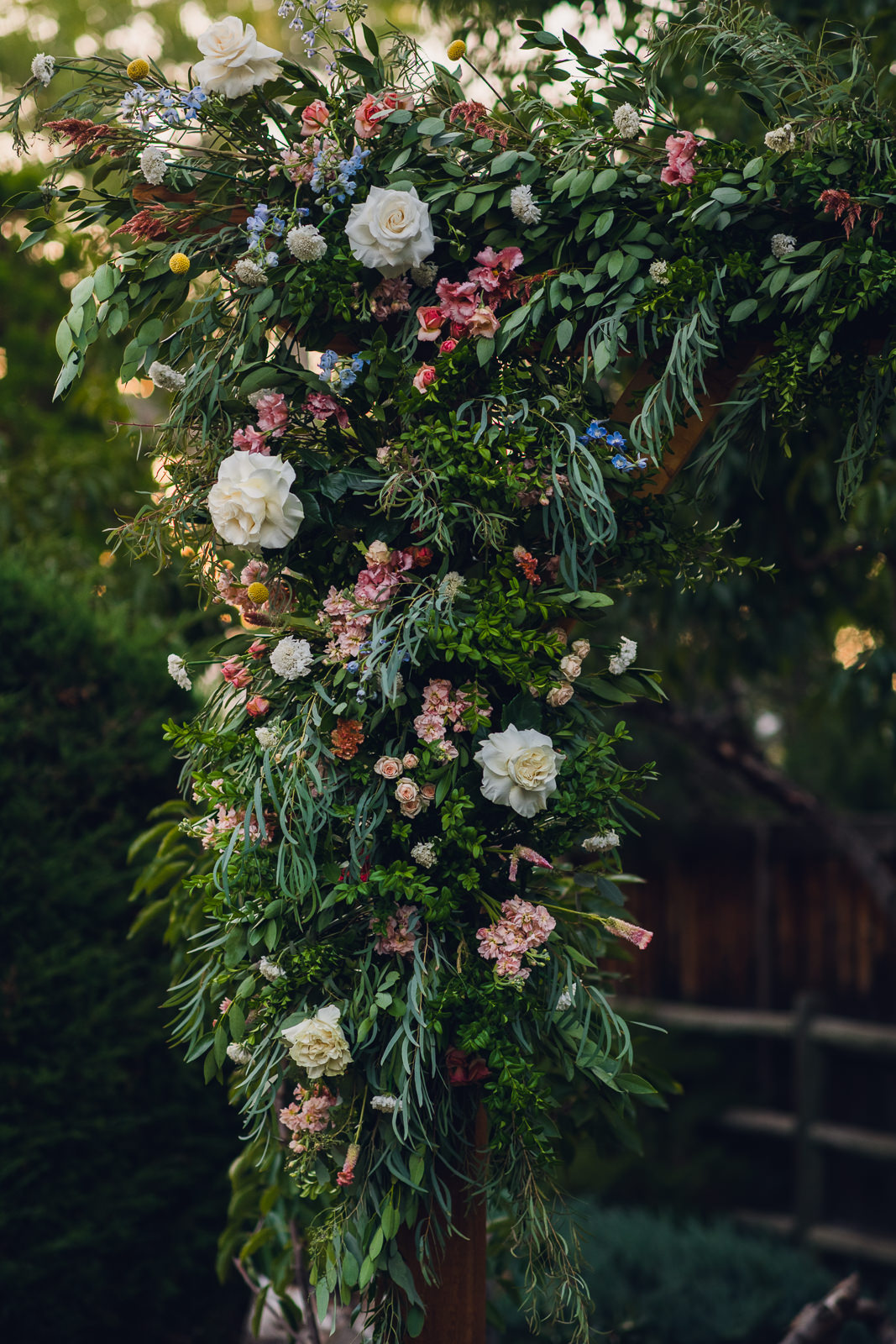 summer backyard garden wedding floral ceremony arch