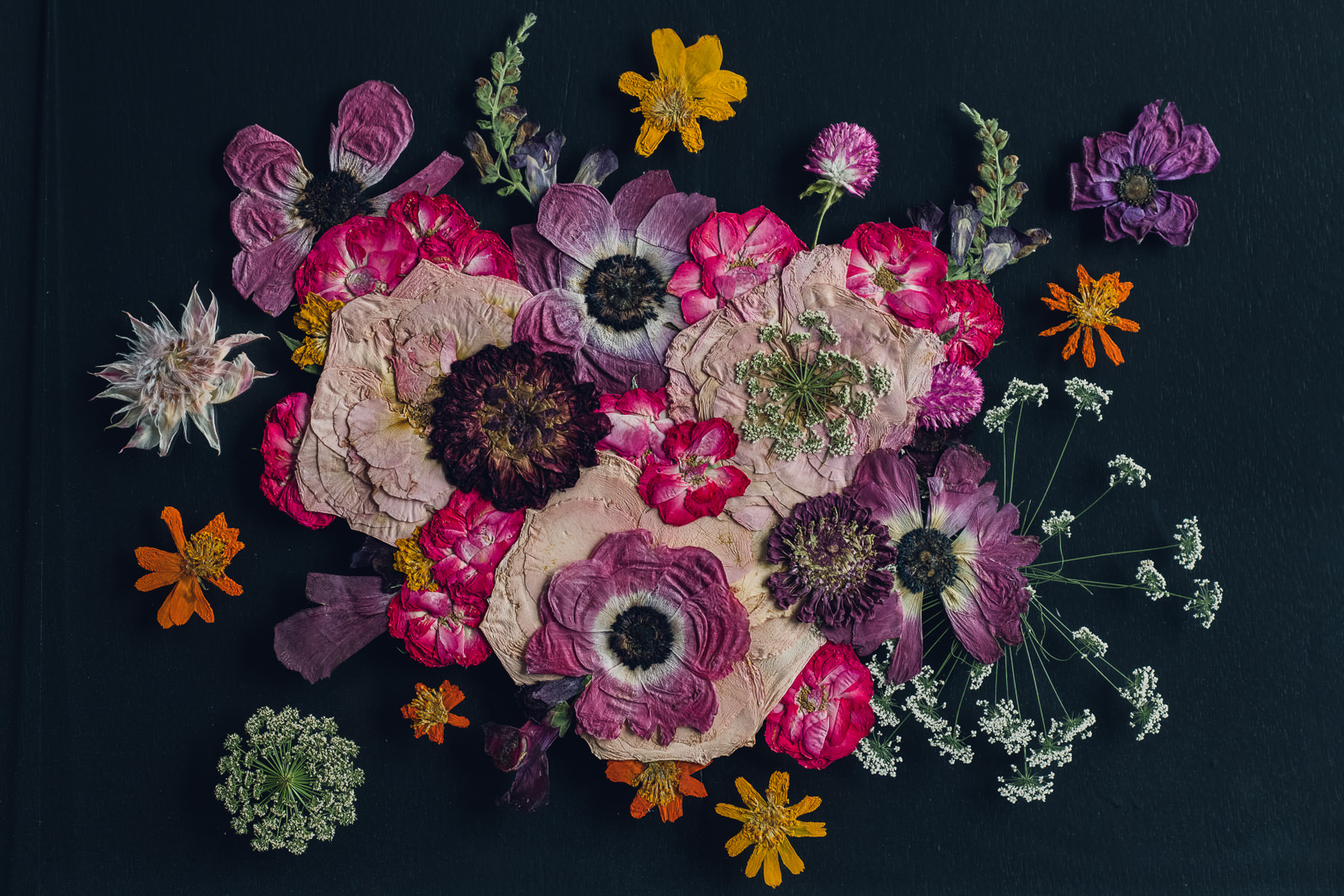 colorful pressed flower art made from bridal bouquet preservation