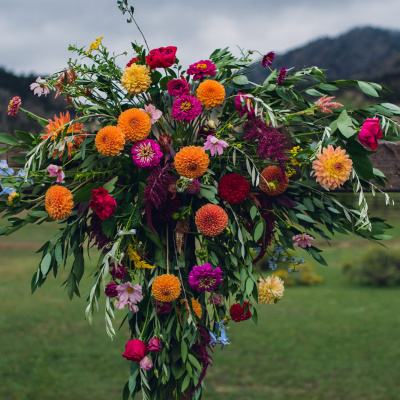 Vibrant Late Summer Wedding Arch Florals